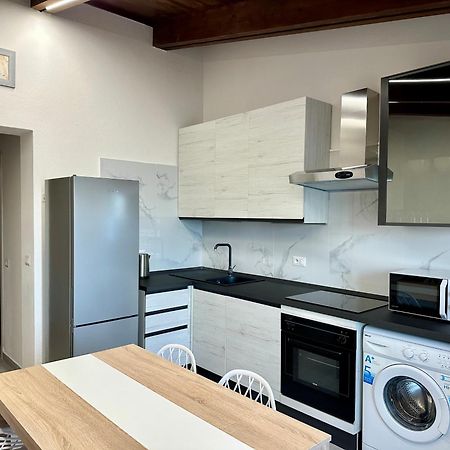 Approdo Apartments Isola Rossa Exterior photo