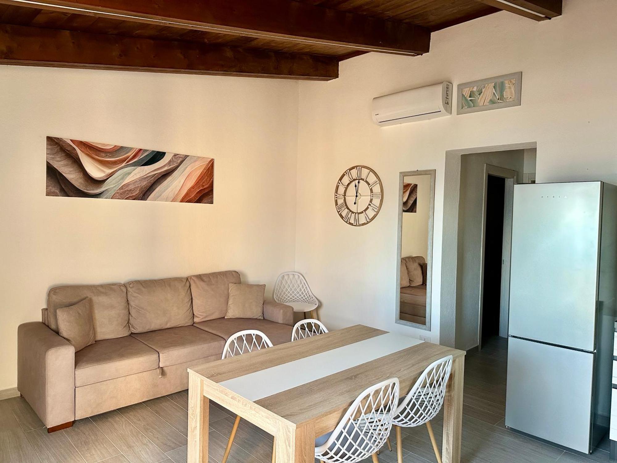 Approdo Apartments Isola Rossa Exterior photo