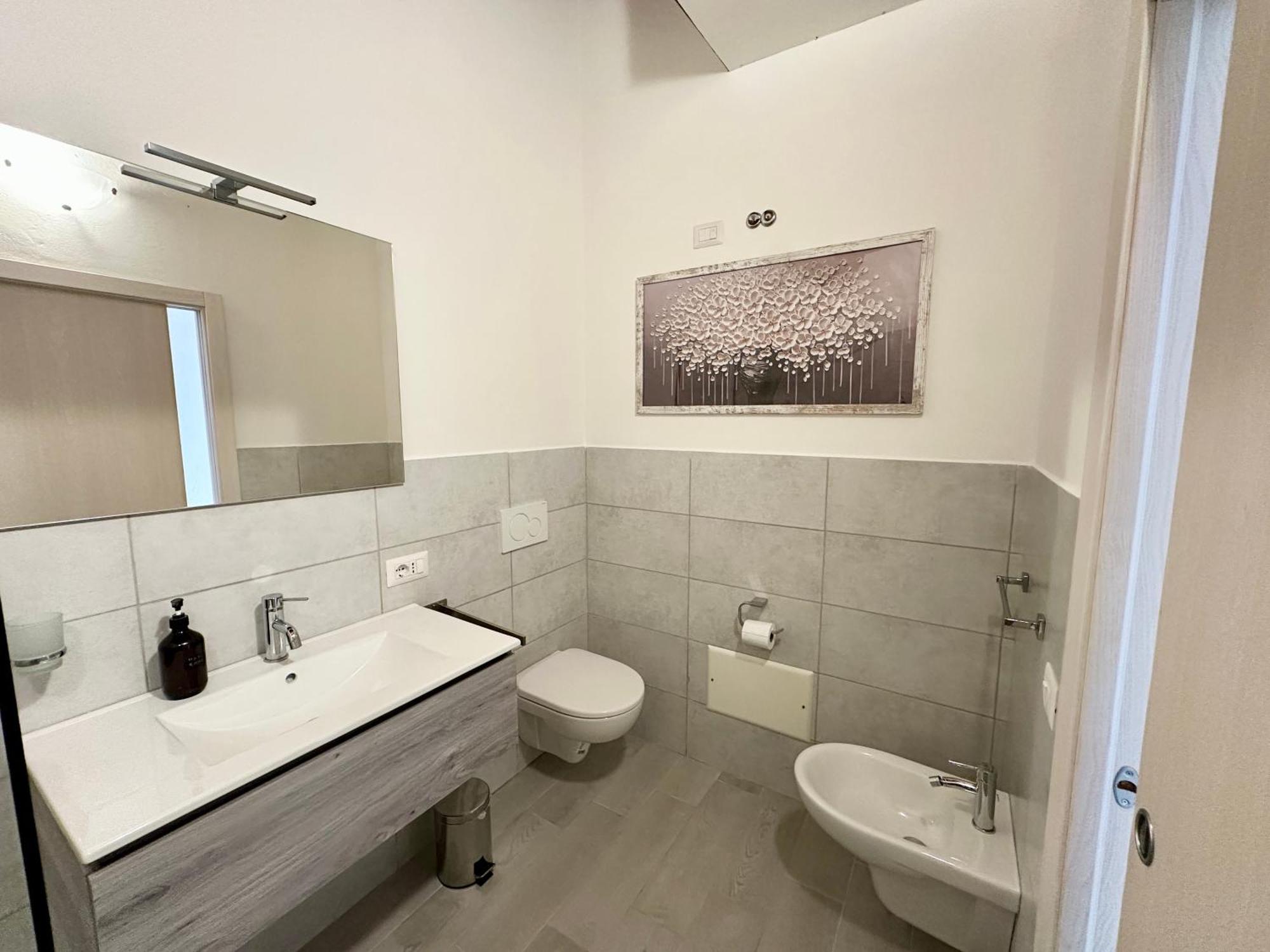 Approdo Apartments Isola Rossa Exterior photo