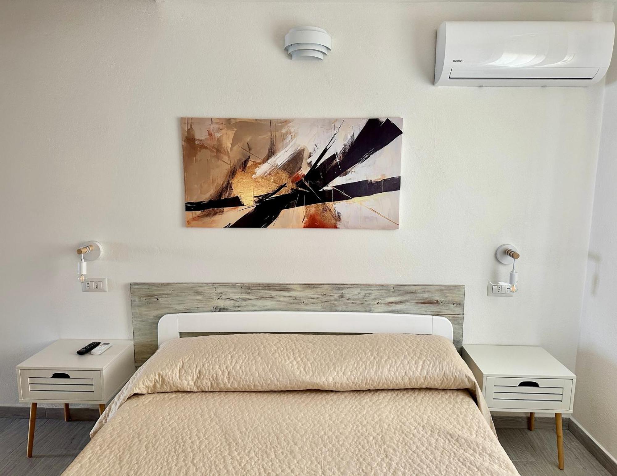 Approdo Apartments Isola Rossa Exterior photo